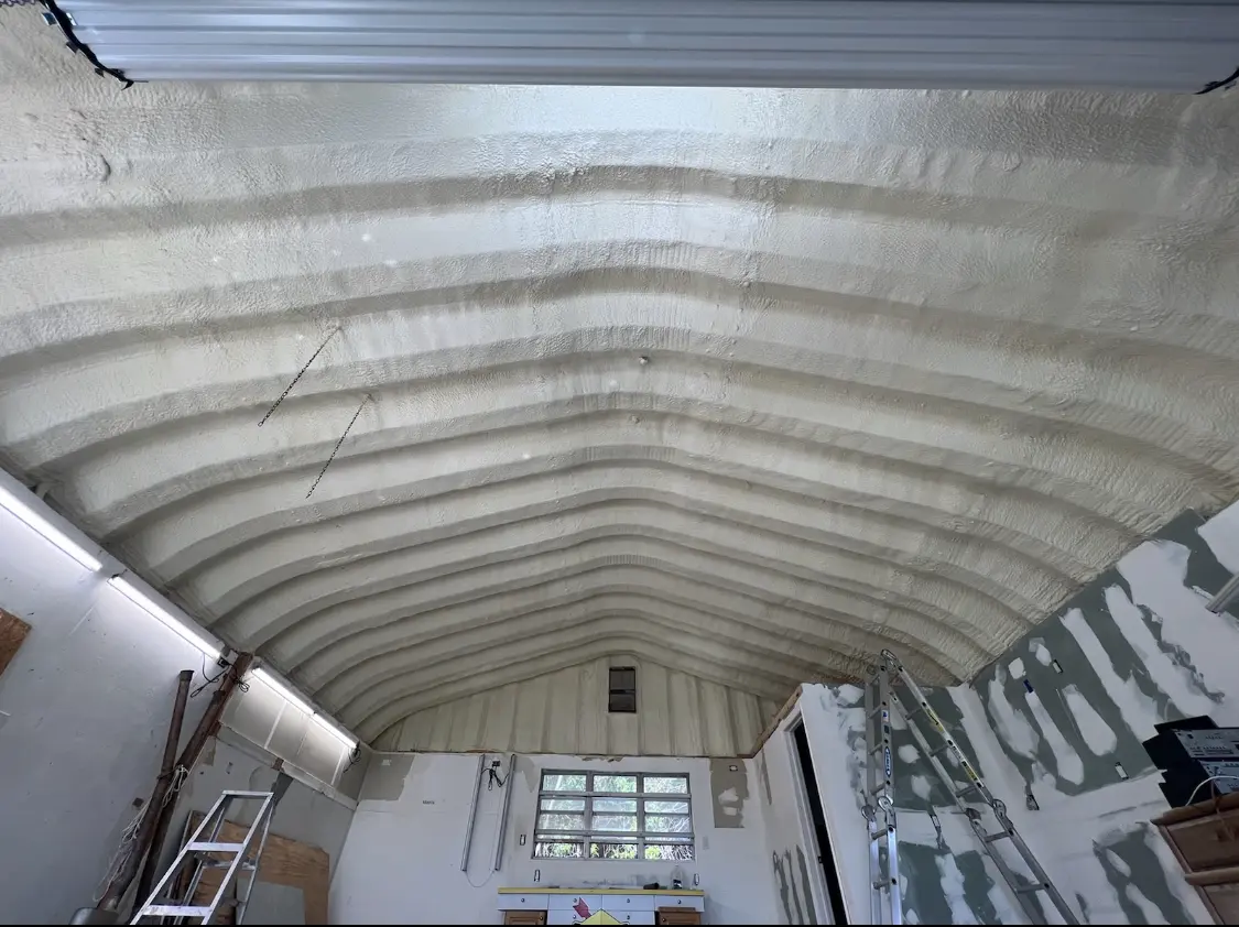 Spray polyurethane foam applied to the underside of a metal roof deck in Bowling Green